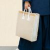 woman carrying large shopper bag made from sustainable cotton and hemp